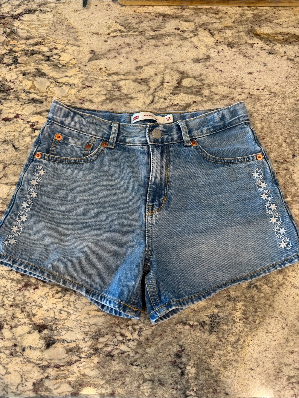 Levi's Light Blue Denim Shorts with White Floral Embroidery